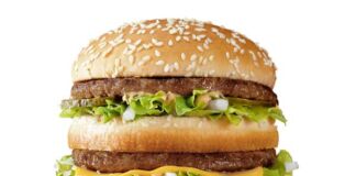 comensales McDonald's preparan su hamburguesa